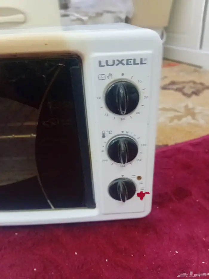 فرن كهربائي نظيف وشغال 0