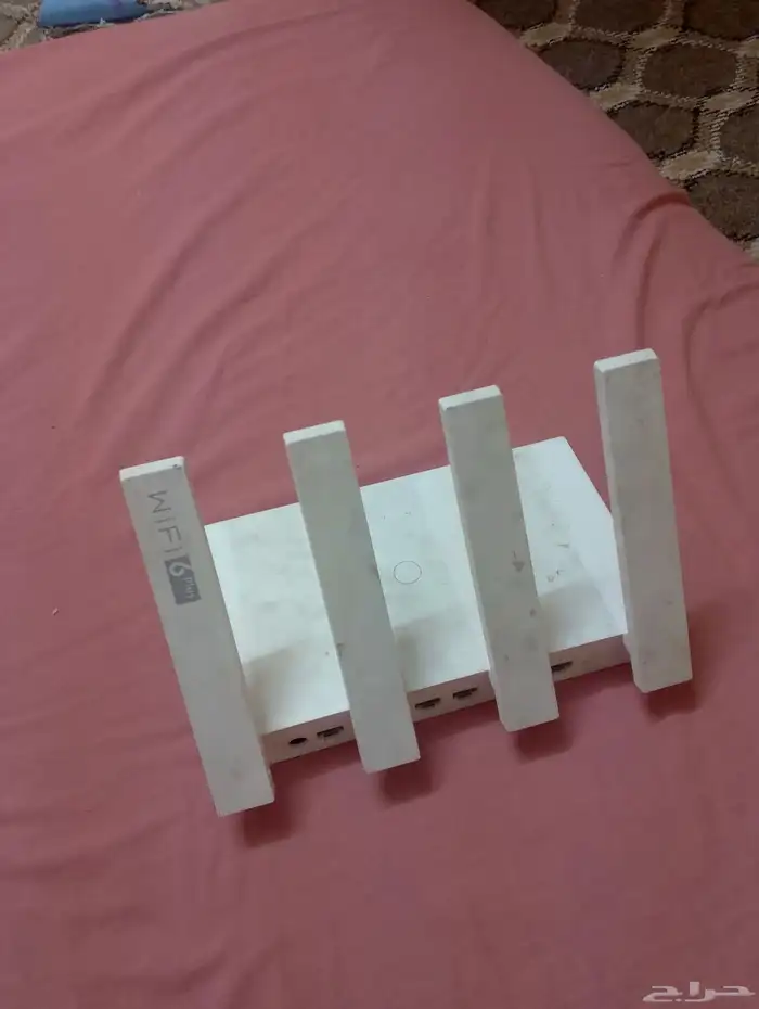 مقوي من شركة هواوي واي فاي AX3 يعمل المقوي عن طريق السلك 0