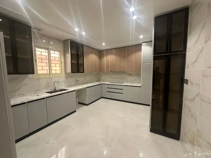 شقه ارضيه للبيع حي اليرموك مساحه كبيره 4