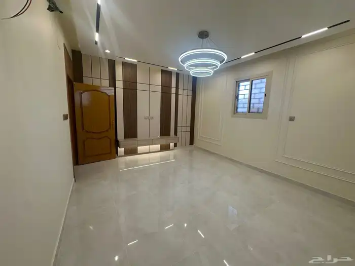 شقه ارضيه للبيع حي اليرموك مساحه كبيره 1