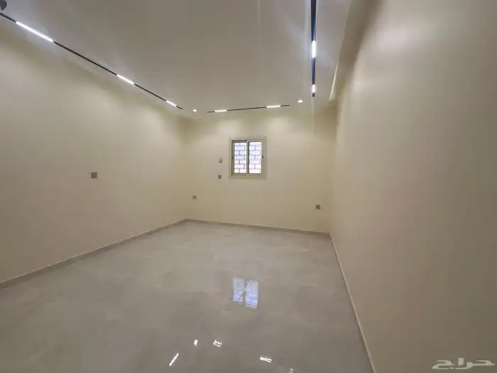 شقه ارضيه للبيع حي اليرموك مساحه كبيره 13