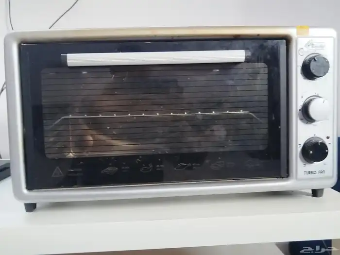 ماكرويف فرن على الشرط استخدام حشمه على السرط 0