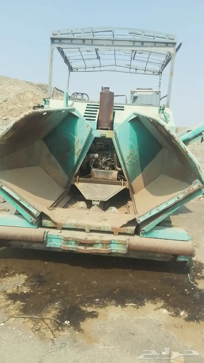 أسفلت وآلة فرش إسفلت بحالة جيدة جدا 0