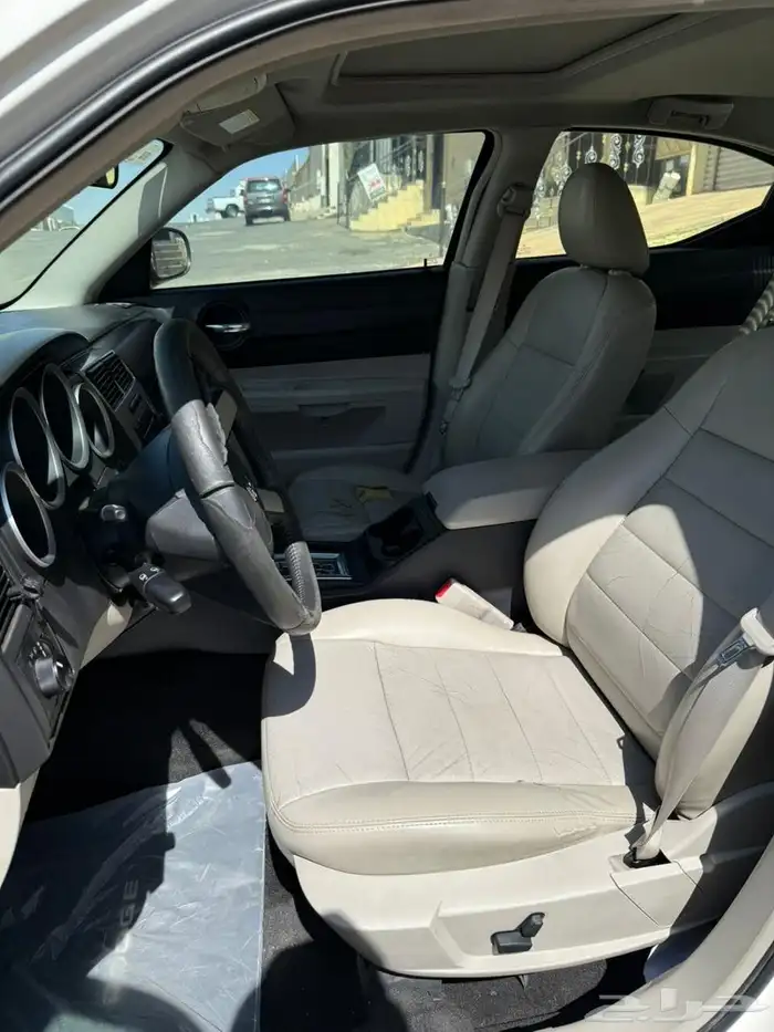 دوج تشارجر 2007 أبيض SXT 6 سلندر 9