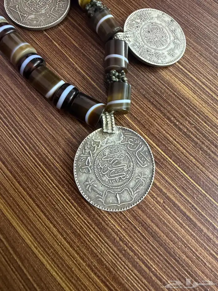 سلاسل تحمل ريالات فضه خالص قديمه اصليه 100 2