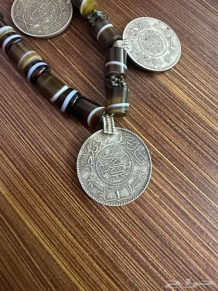 سلاسل تحمل ريالات فضه خالص قديمه اصليه 100 1