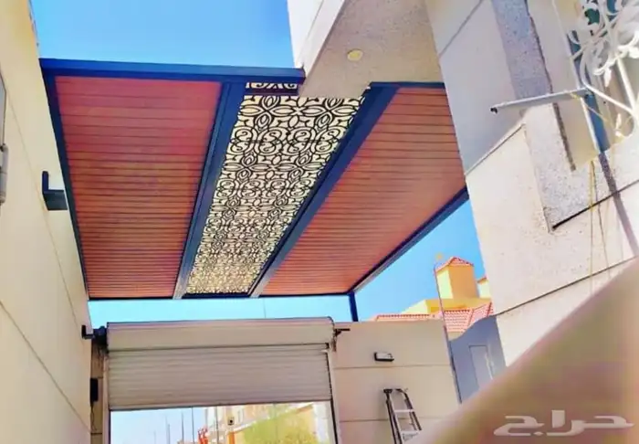 تلبيس ابواب حديد بالواح بديل خشب  فخامة  متانة  وجمال يدوم 0