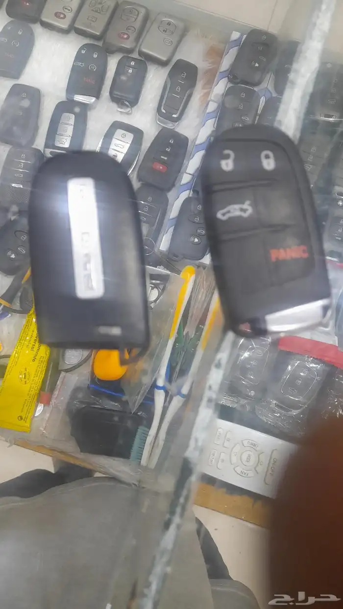 فتح ونسخ وبرمجة السيارة فك أبواب سيارات وشقق وخزنات تصليح ري 0