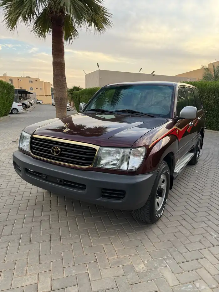 لاندكروزر 1999 قير عادي (عنابي) ممشى قليل 1