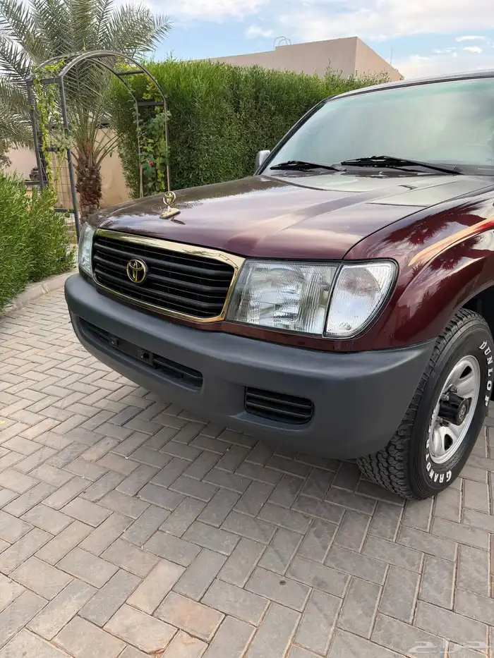 لاندكروزر 1999 قير عادي (عنابي) ممشى قليل 7