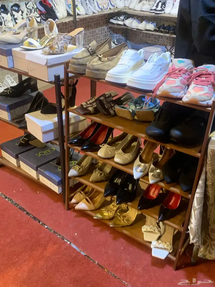 تصفية لمحل أحذية رجالي ونسائي 1