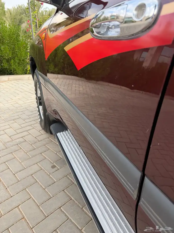 لاندكروزر 1999 قير عادي (عنابي) ممشى قليل 32