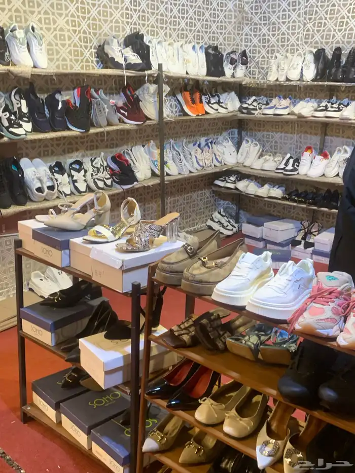 تصفية لمحل أحذية رجالي ونسائي 2