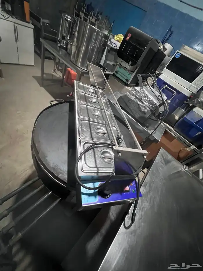 ساج شورما وساج فطير وطولت مغسل وسخان أمركي وثلاجة تجميد و 9