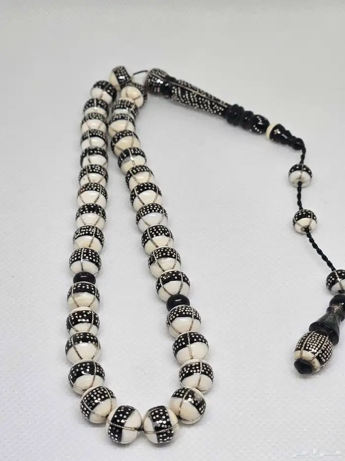 سبحة عاج مطعمة فضه ويسر 1