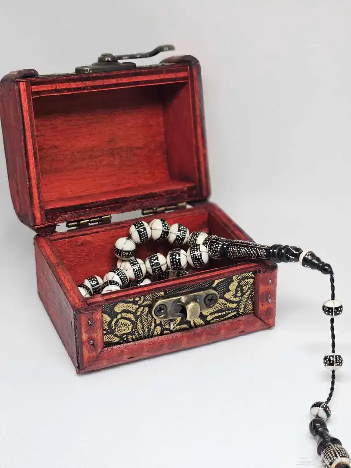 سبحة عاج مطعمة فضه ويسر 0