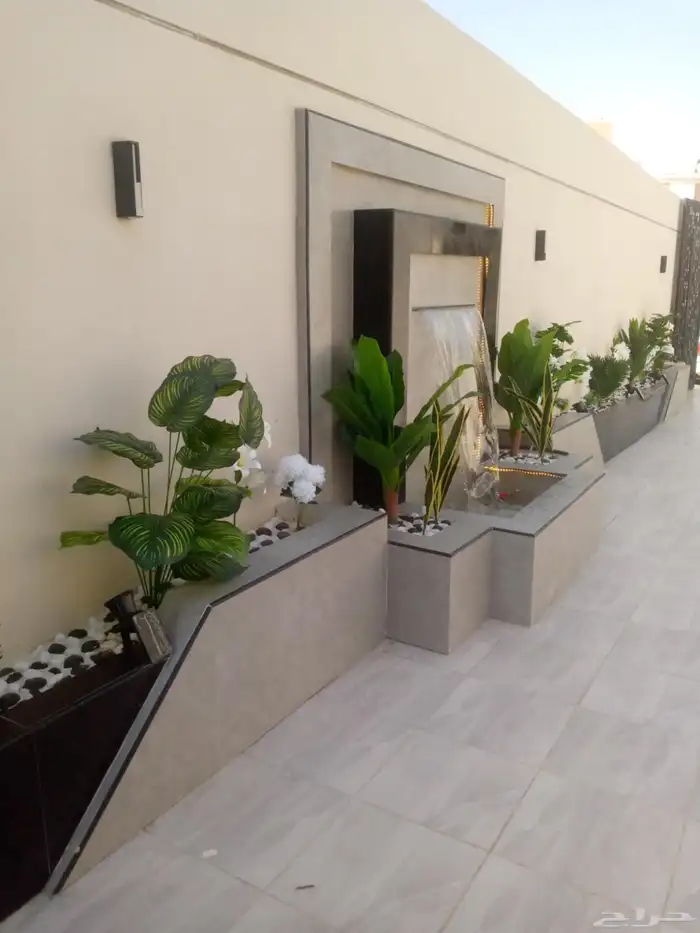 العشب الصناعى والتكسيات الخشبيه 7