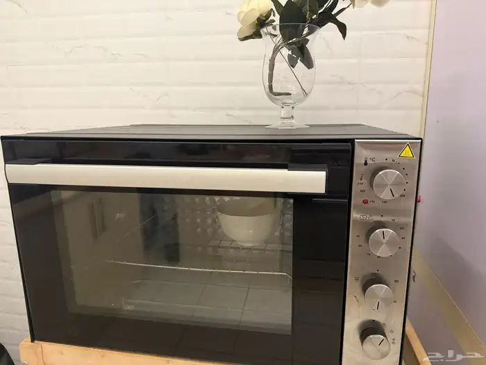 فرن غاز مقاس 70 و غساله صحون هاس وعيون قز غاز ايطالي 0