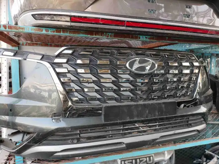 صدام أمام كريتا قراند 22-24 اصلي 0