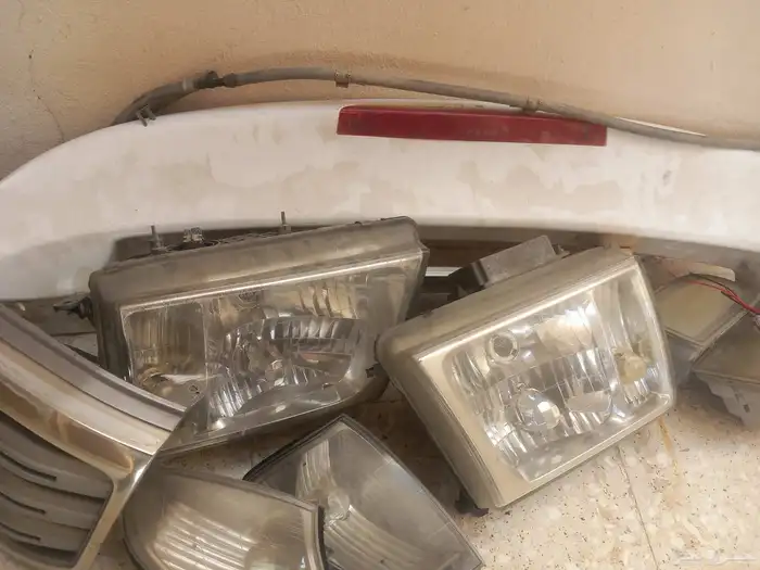 جناح وشبك وكشافات وشمعات فكسار 2003 لاند 3