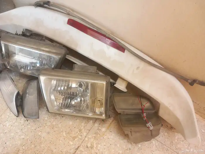 جناح وشبك وكشافات وشمعات فكسار 2003 لاند 1