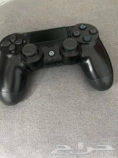 جهاز سوني 4 مع يد تحكم تجاريه 1