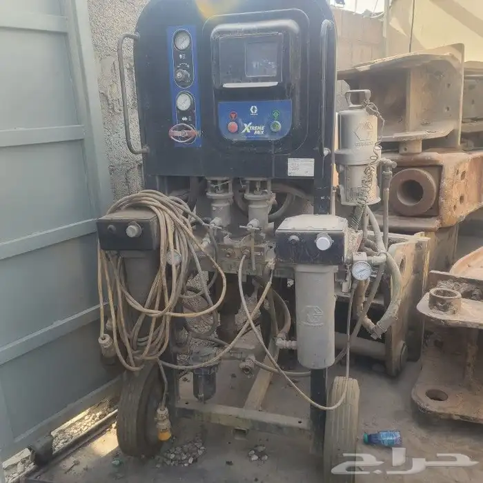 مضخة رش دهان صناعية من طراز Graco Xtreme. 1