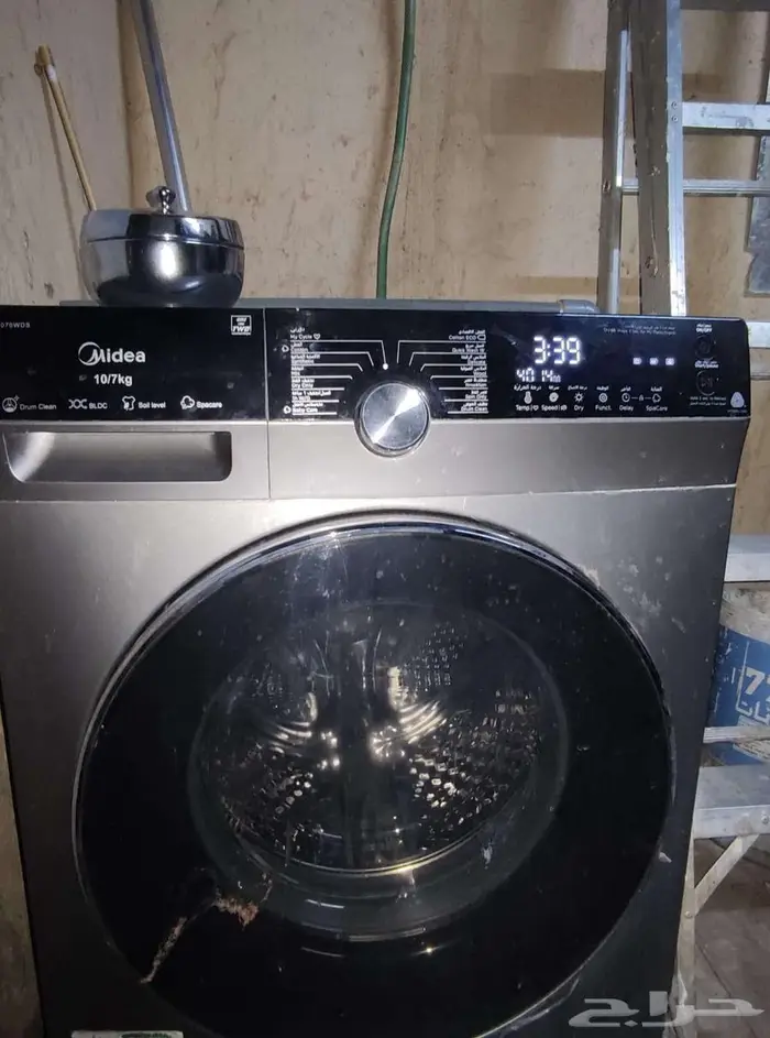 للبيع غسالة ميديا 10 كيلو مع كنبة midea 0
