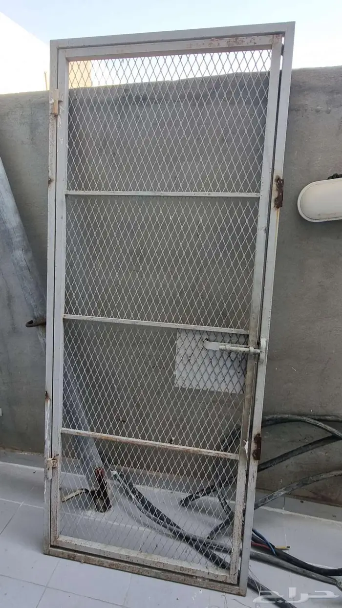 باب حديد شبك ب 100 0