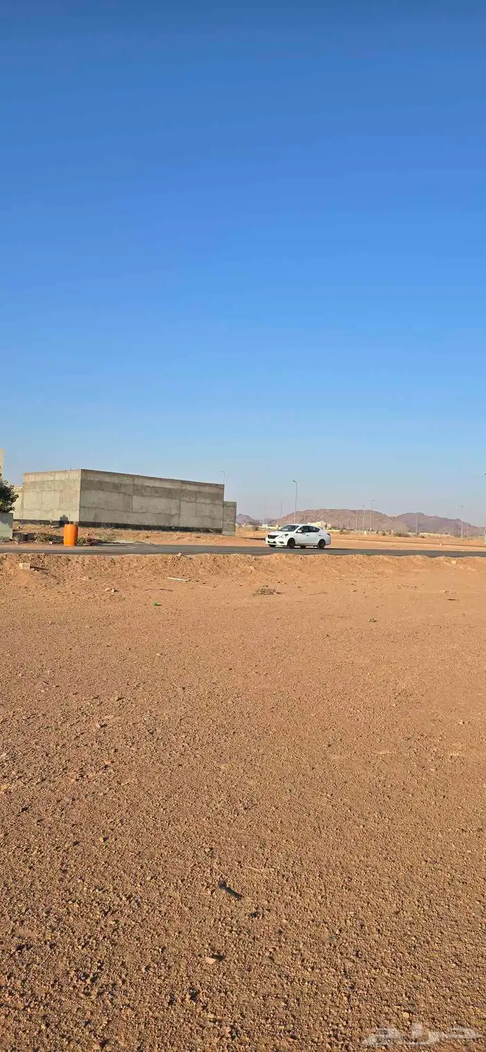 ارض في حي الودي قريبة من الدوار 2
