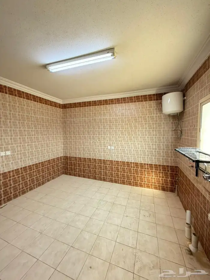 شقه للايجار بحي اليرموك 6