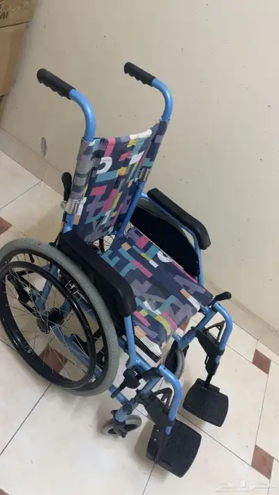 عربية اطفال   كرسي متحرك index