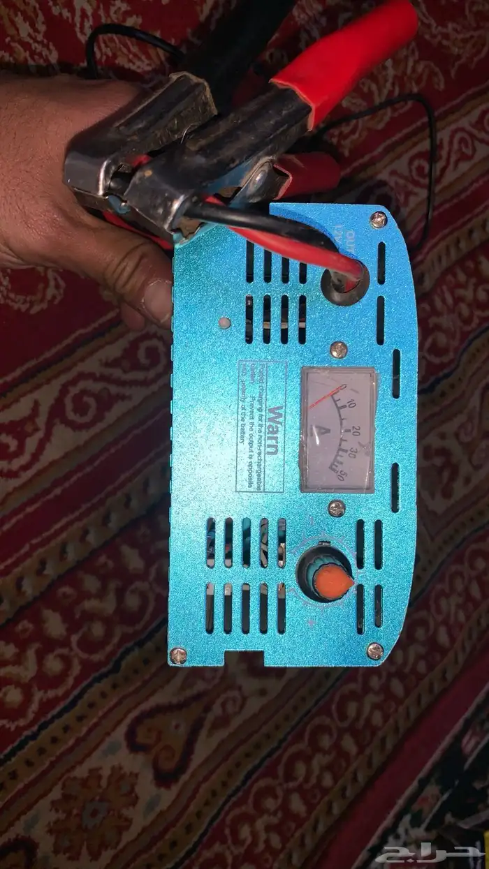شاحن بطارية شبه جديد على السوم 1
