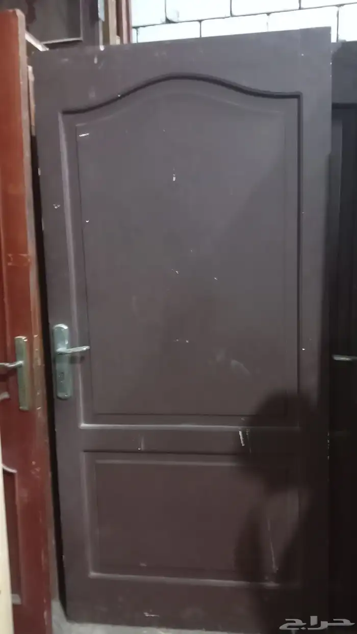 عندنا ابواب خشب مستخدمه وحديد والمنيوم جديد للبيع 1