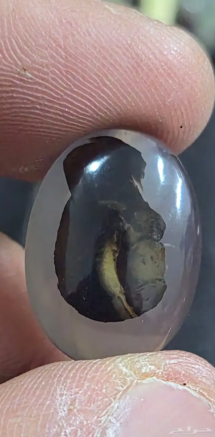 حجر عقيق مصور - وجه طفل و وجه رجل 1