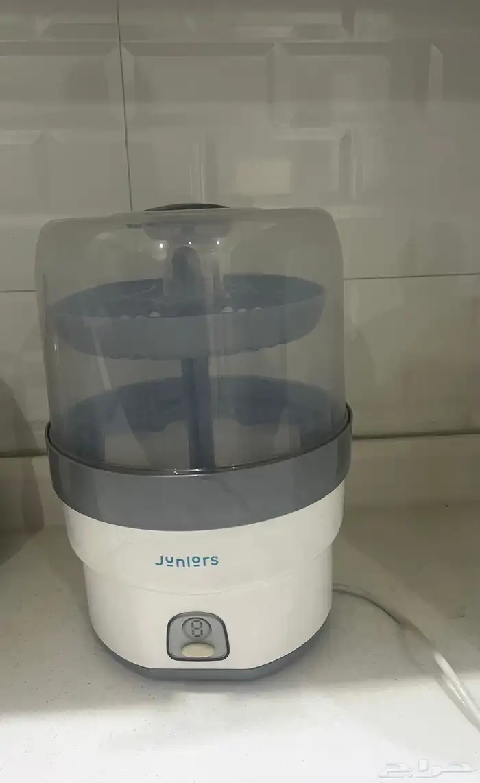 اله تعقيم الرضاعات 0