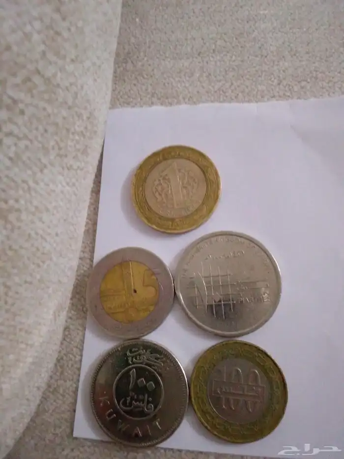 عملات معدنية صغيرة من خمس دول 0