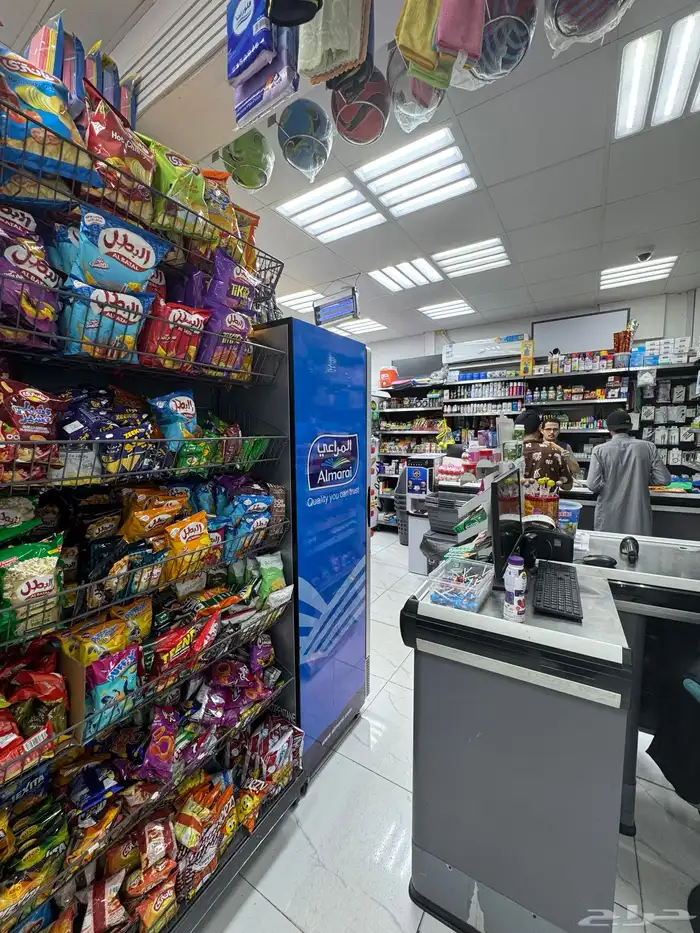 سوبر ماركت للتقبيل مع السجل مساحه 250 متر 4 فتحات 6