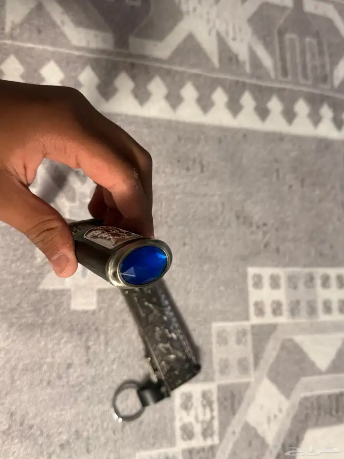 سكين قديمه جدا عمرها فوق ال 20 سنه منحوتة برسومات 4