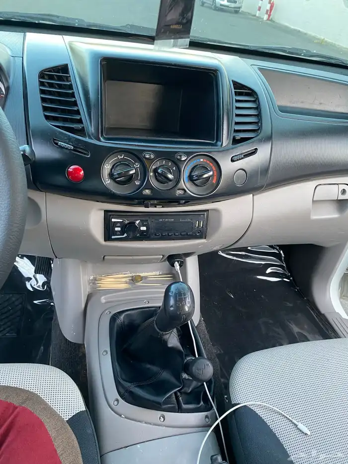 متسوبيشي 2012 دبل بنزين 32