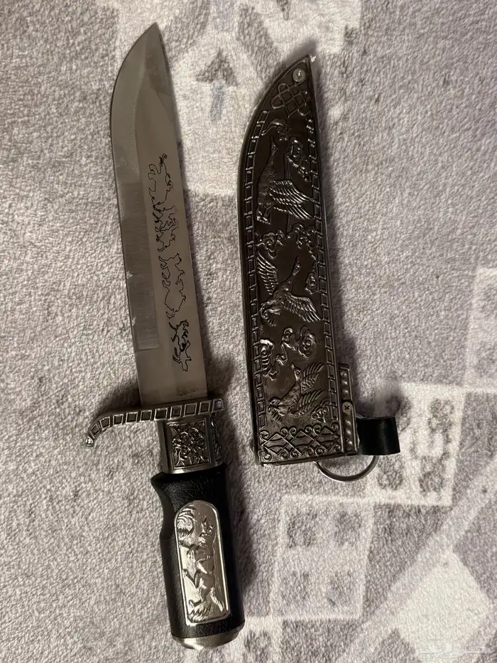 سكين قديمه جدا عمرها فوق ال 20 سنه منحوتة برسومات 3