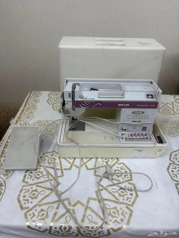 مكينة خياطة 0