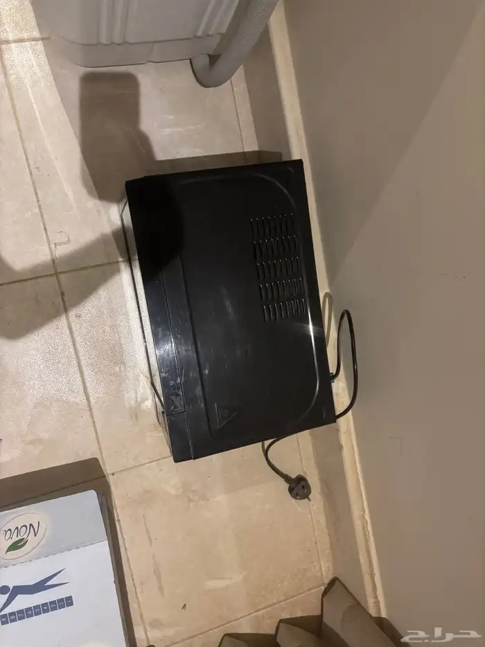 غسالة Haam و ميكرويف LG 7