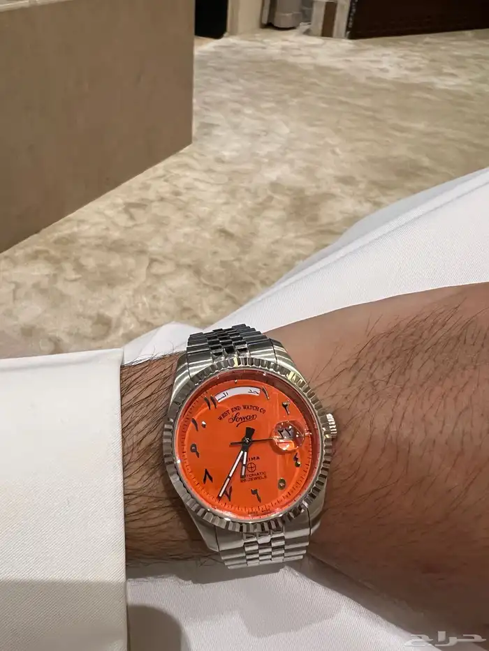 للبيع ساعه ويست إند واتش كو مستخدمه لون برتقالي نظيف جد ا 0