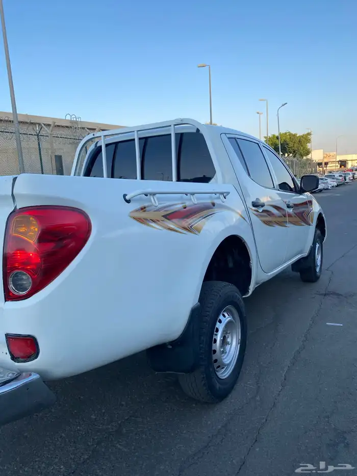 متسوبيشي 2012 دبل بنزين 12