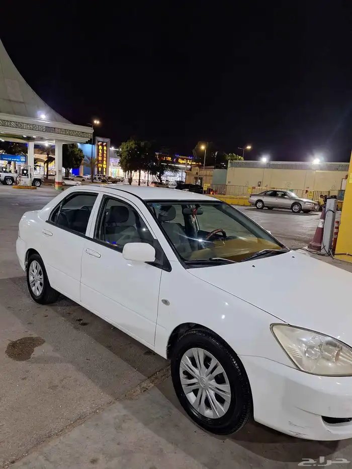 السلام عليكم سياره ميتسوبيشي لانسر 2011 للبيع كامله اوتومات 2