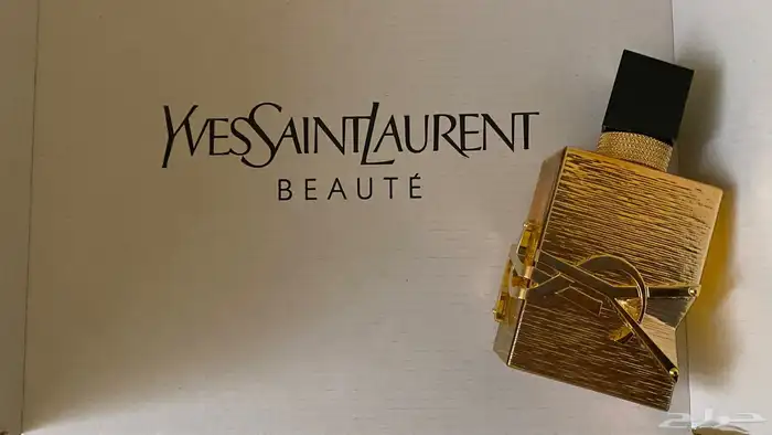 عطر إيف سان لوران إصدار ذهبي مستعمل استعمال خفيف جدا  رشتين 2