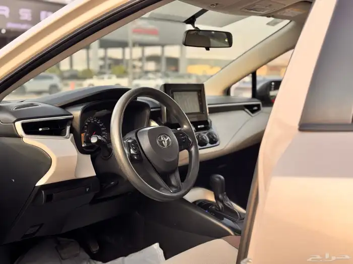 تويوتا كورولا 2023 ابيض 1.5 9