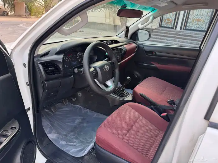 تويوتا هايلوكس GLI 2019 بنزين دبل عداد قليل نظيفه 8