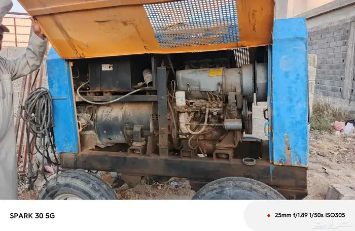 مولد كهرباء كبير مع مكينه لحام 5